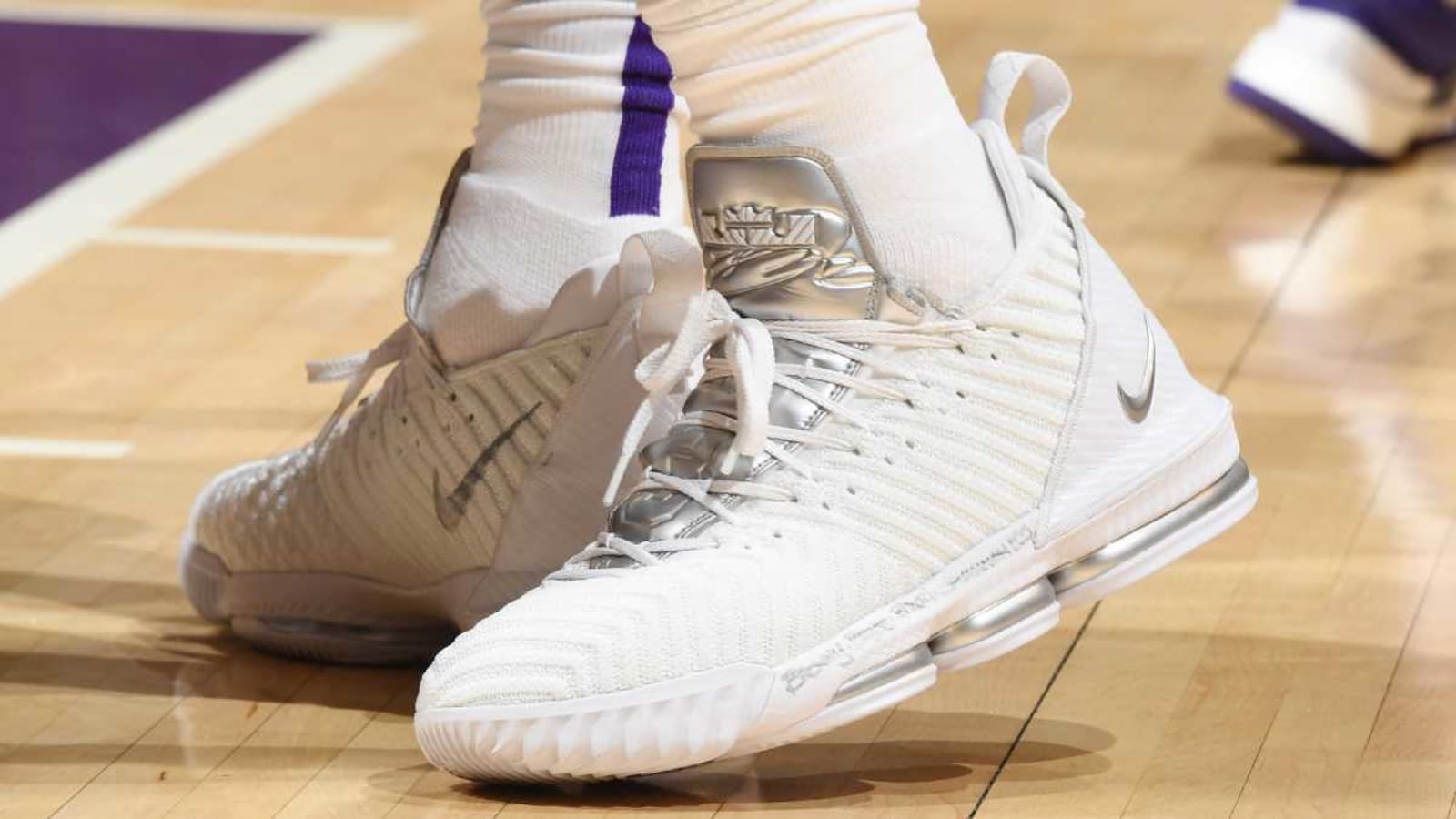 white lebrons with strap